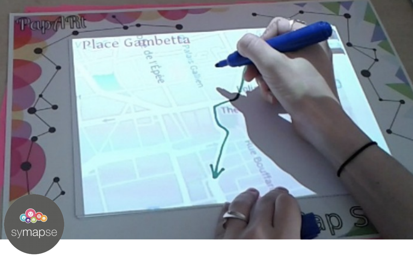 drawing on a paper map using Spatial Augmented Reality